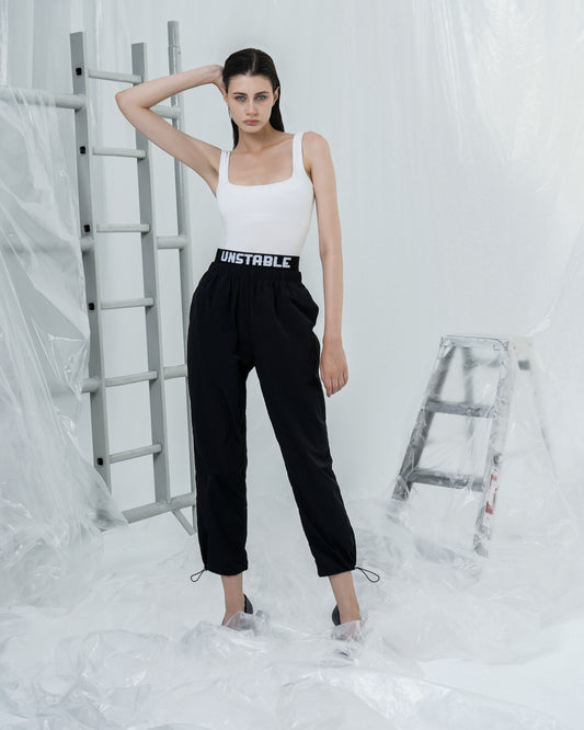 UNSTABLE WAISTBAND LOGO TROUSERS